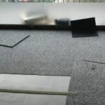 Sample grey carpet and flooring installation in an office or condo space.