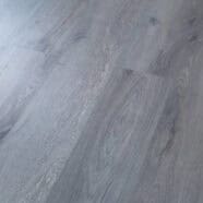 Grey wooden floor laminate for condo interiors and office spaces.