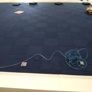 Installation of carpet tiles in the meeting room