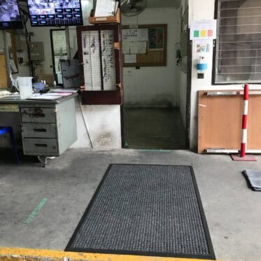 Durable office entrance mat with textured surface, ideal for commercial flooring solutions.