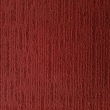Soft red textured carpet for residential and commercial flooring solutions.