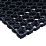 Interlocking rubber floor mat for industrial and commercial use, durable and easy to install.