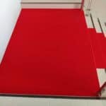 Vibrant red floor carpet suitable for office, condo, and hotel interior designs.