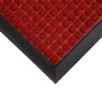 Red patterned carpet with black border suitable for condo and office flooring.