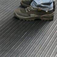 Durable black rubber flooring suitable for condominiums, bedrooms, and offices.