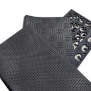 Rubber mats with textured and patterned surfaces for flooring and outdoor use.