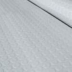 Non-slip white rubber floor tiles with circular pattern for commercial and residential spaces.