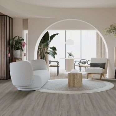 Modern living room with stylish flooring and contemporary furniture.